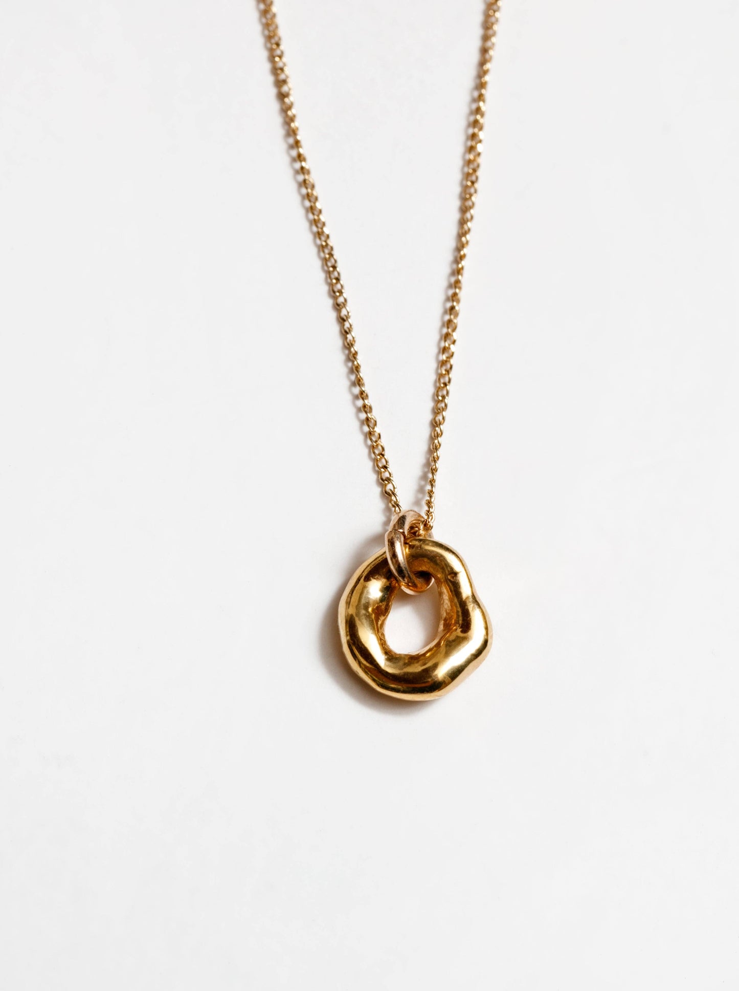 Gold Textured Oval Pendant Necklace