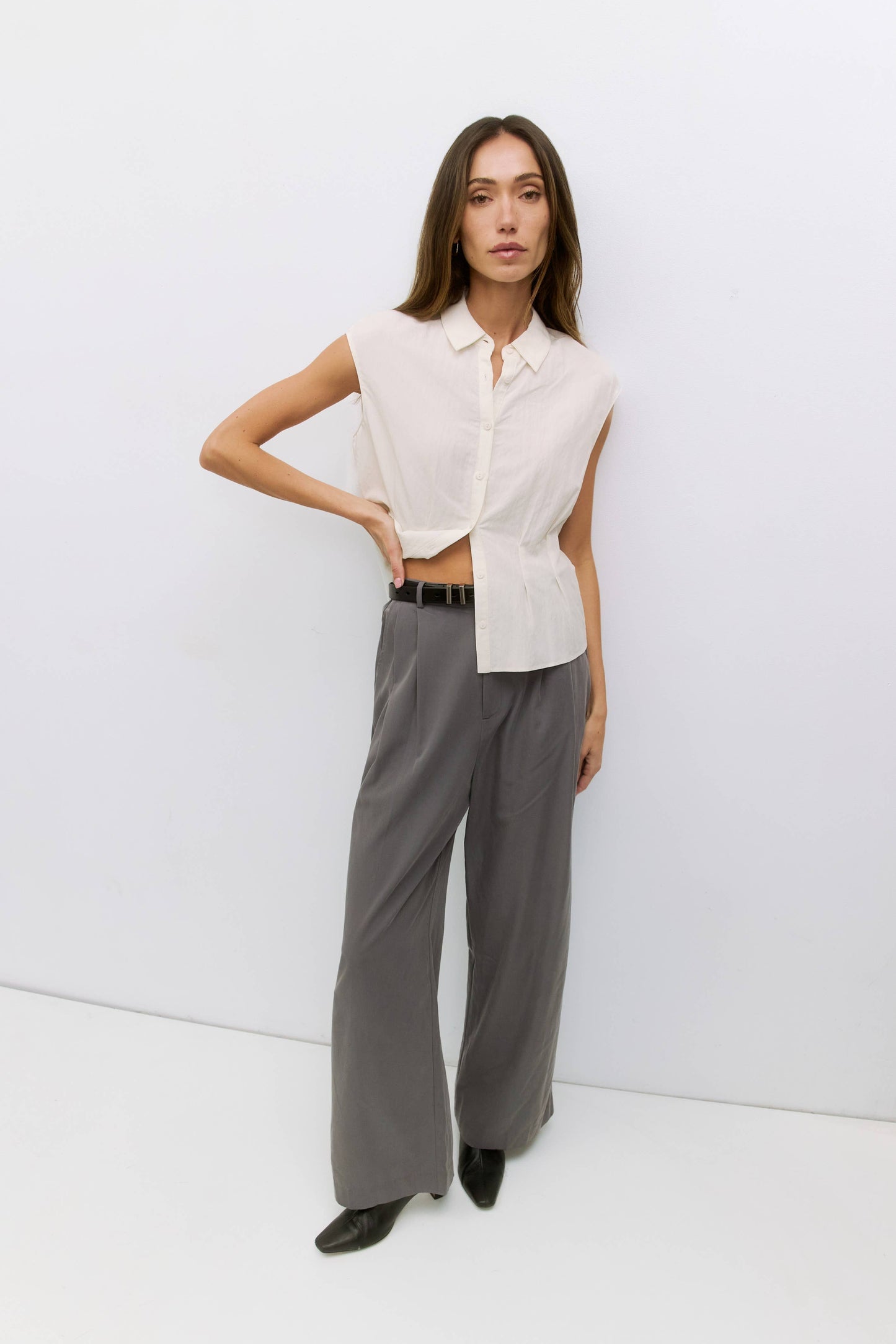 Ivory Sleeveless Woven Button-Up Top